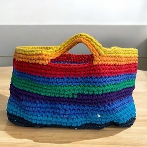 Handmade ladies bag made from recycled fabric strips.
Crochet bag.
